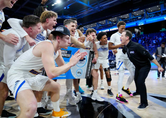 UC Santa Barbara coach Joe Pasternack and players celebrate their men’s Big West Tournament win